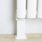 Floor bracket for tall white radaitor 